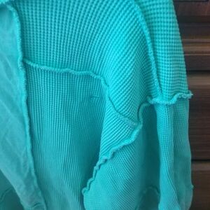 Zyia distressed look green sweater.